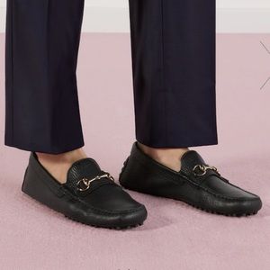 Gucci size 9 black horsebit loafers with brass hardware